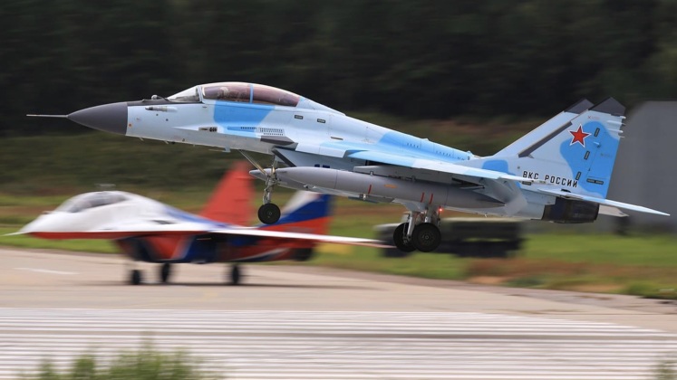 MiG-35 Takes Off With MiG-29 in Background