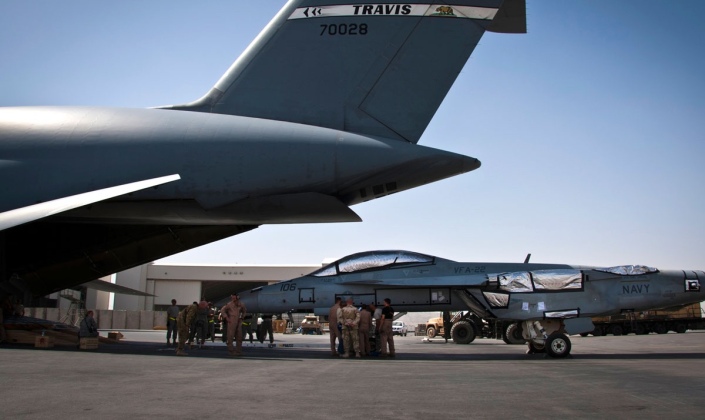Loading of F-18 Fighter with Wings Removed Onto C-5 Transport