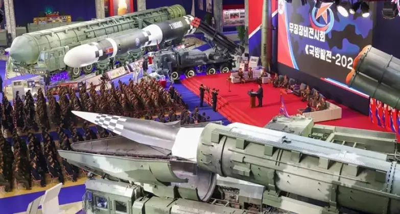 Chairman Kim Speaks at the Opening of Defence Development-2025 with Hwasong-16B in the Foreground
