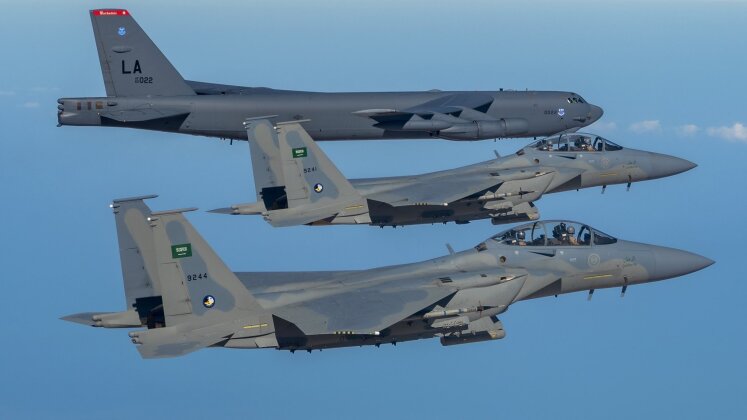 Royal Saudi Air Force F-15s Escourt U.S. Air Force B-52H Strategic Bomber Royal Saudi Air Force F-15s Escourt U.S. Air Force B-52H Strategic Bomber