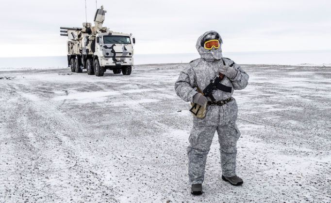 Russian Serviceman and Pantsir Air Defence Combat Vehicle in the Arctic Russian Serviceman and Pantsir Air Defence Combat Vehicle in the Arctic