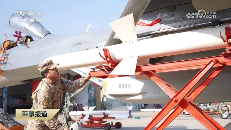 Chinese Ground Crew at the Air Force Engineering University Integrate R-27 Missile on J-11A Fighter