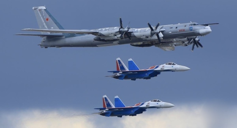 Su-35 Fighters Escort Tu-95MS Strategic Bomber