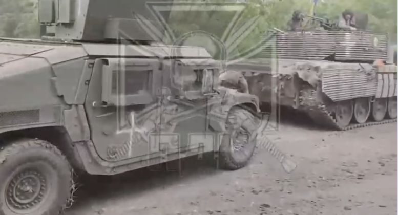 Polish Volunteer Corps Humvee and Leopard 2 During May 2023 Assault with Ukrainian Forces into Belgorod Polish Volunteer Corps Humvee and Leopard 2 During May 2023 Assault with Ukrainian Forces into Belgorod