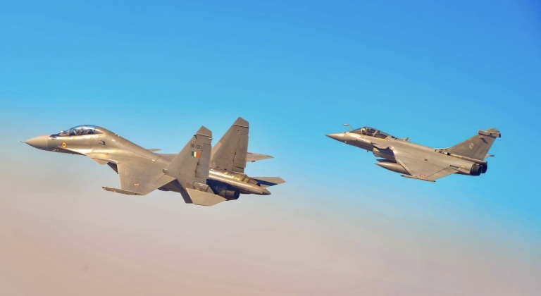 Indian Air Force Su-30MKI (front) and Rafale Fighters Indian Air Force Su-30MKI (front) and Rafale Fighters