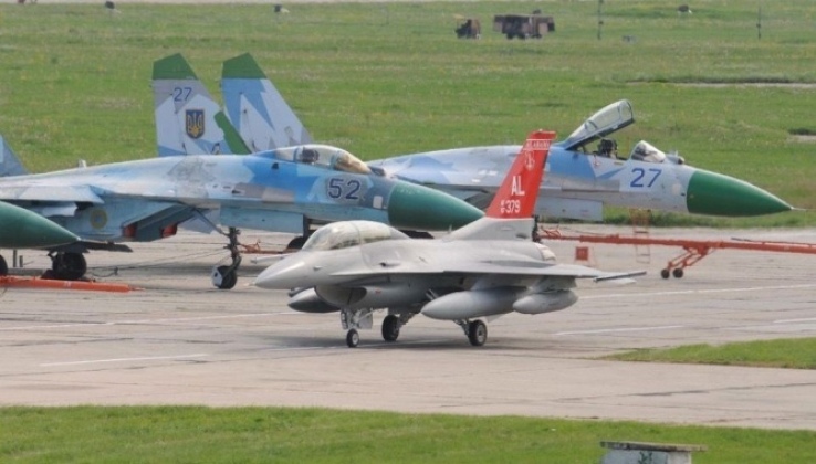 Ukrainian Air Force Su-27 Heavyweight Fighters (let) and F-16 Lightweight Fighter