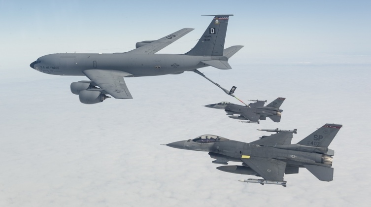 U.S. Air Force KC-135 Refuels F-16 Short Range Fighters