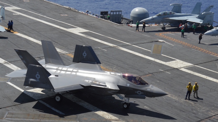 Marine Corps F-35C and Navy F-18E/F Fighters on the Supercarrier USS Abraham Lincoln