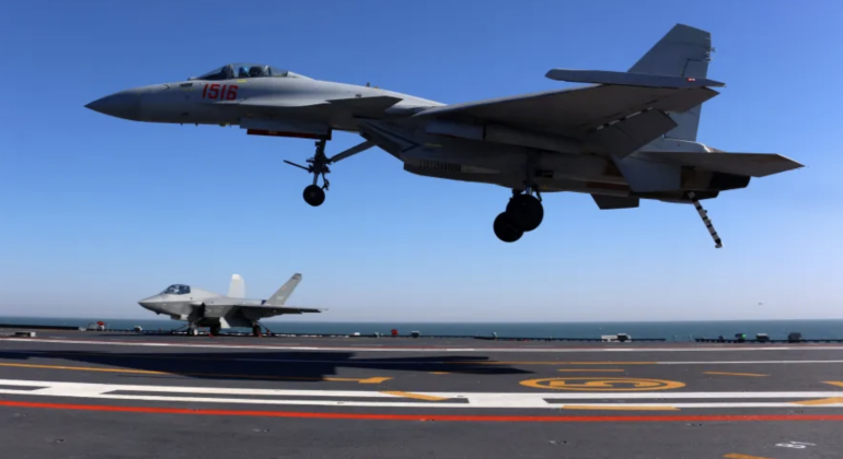 J-15 Landing on Supercarrier Fujian with J-35 in the Background J-15 Landing on Supercarrier Fujian with J-35 in the Background