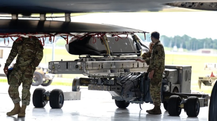 U.S. Air Force Personnel Prepare to Load an AGM-158C LRASM onto a B-2 U.S. Air Force Personnel Prepare to Load an AGM-158C LRASM onto a B-2