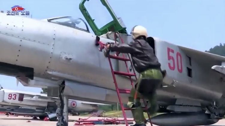 Korean People`s Army MiG-23ML Pilot Boards Fighter