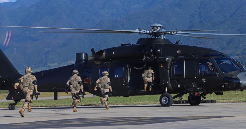 Chinese PLA Army Personnel Embark on Z-20 Helicopter