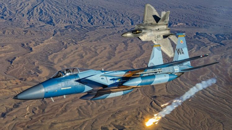 F-15C (front) and F-22A Fighters