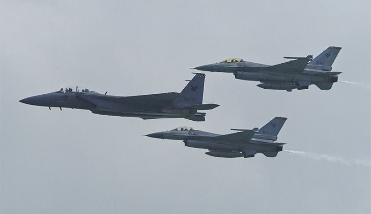 F-15 Heavyweight Fighter Leads F-16 Light Fighters in Formation