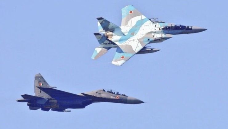 F-15J (top) and Su-30MKI Fighters in Formation
