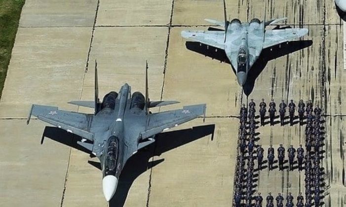 Russian Su-30SM (front) and MiG-29 Fighters 