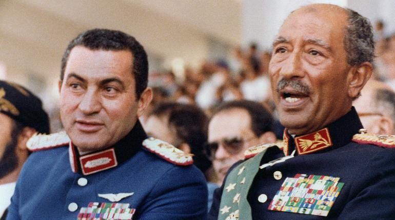 Vice President Hosni Mubarak (left) and President Anwar Sadat