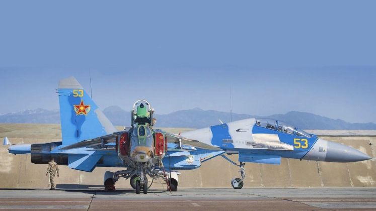 Kazakh Air Force Su-27 (back) and MiG-27 Fighters