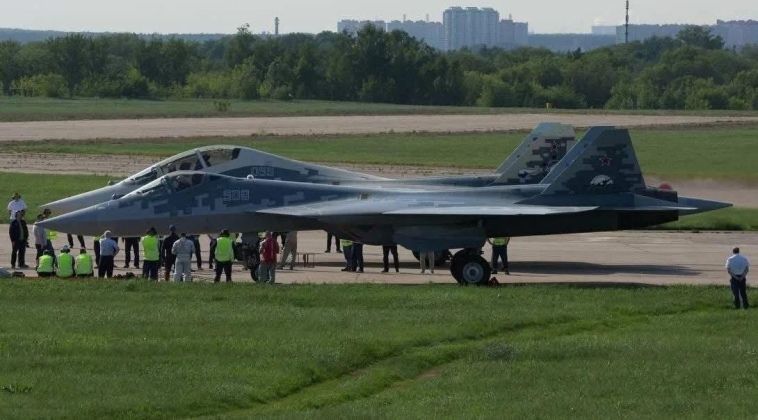 Su-57D Prototype (front) and Su-57 Fighters