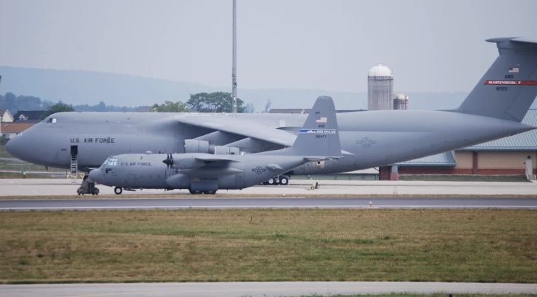 C-5 Heavy Transport Next to C-130 Medium Transport For Scale