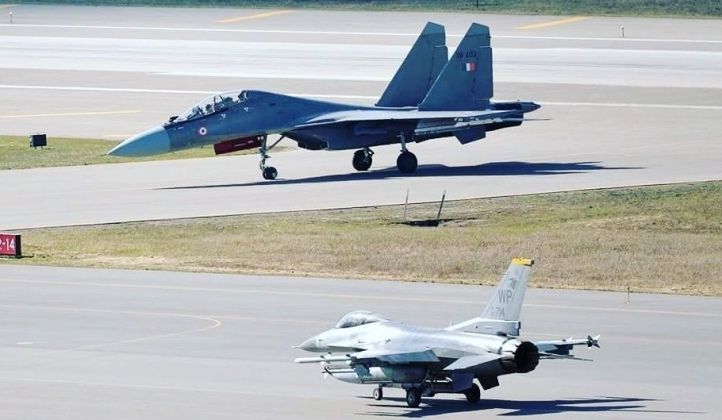 F-16 (front) and Su-30 Fighters