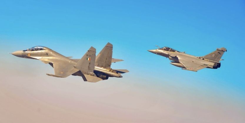 Indian Air Force Su-30MKI Heavyweight (front) and Rafale Lightweight Fighters 