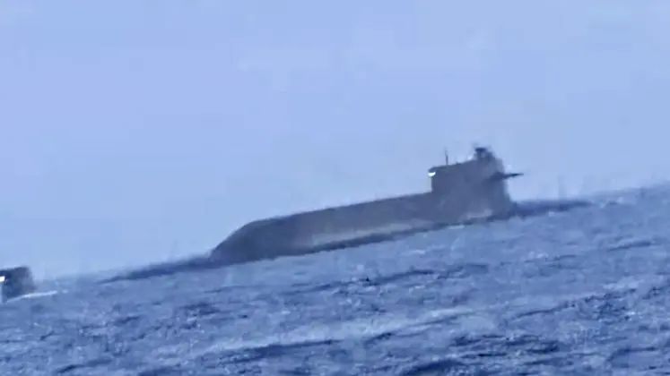 Type 094 Class Submarine Surfaces in the Taiwan Strait