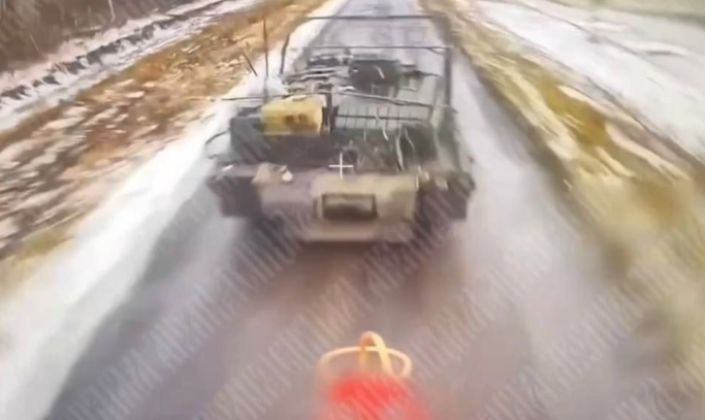 Drone Footage of Up-Armoured Ukrainian Abrams Tank Moments Before Rear Armour Hit
