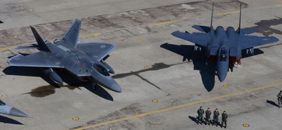 F-15 (right) and F-22