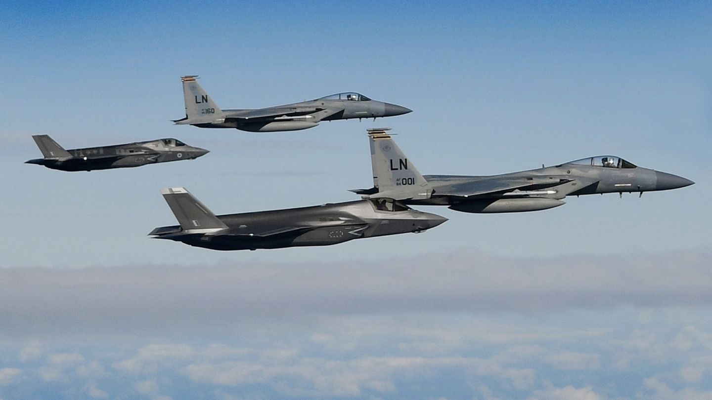 F-15C Eagle (front) and F-35 Fighters