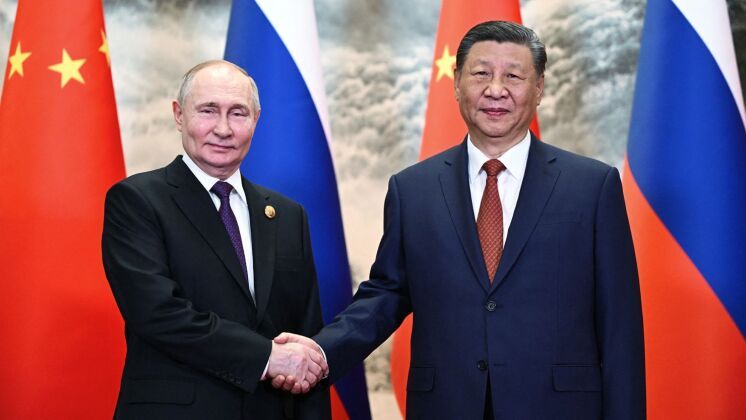 Russian President Vladimir Putin and Chinese President Xi Jinping Shake Hands Prior to Talks in Beijing on May 16, 2024