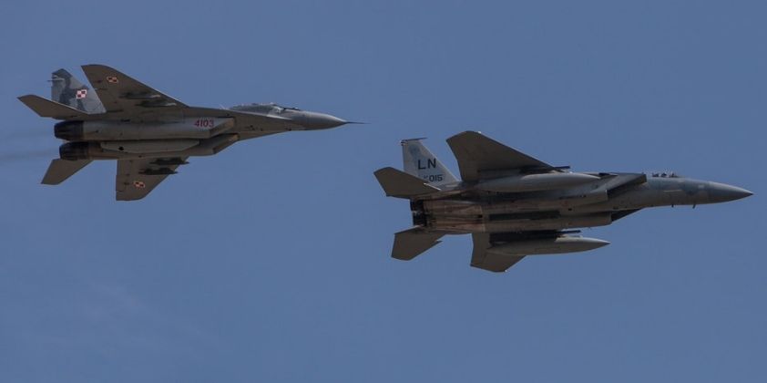 F-15 (front) and MiG-29