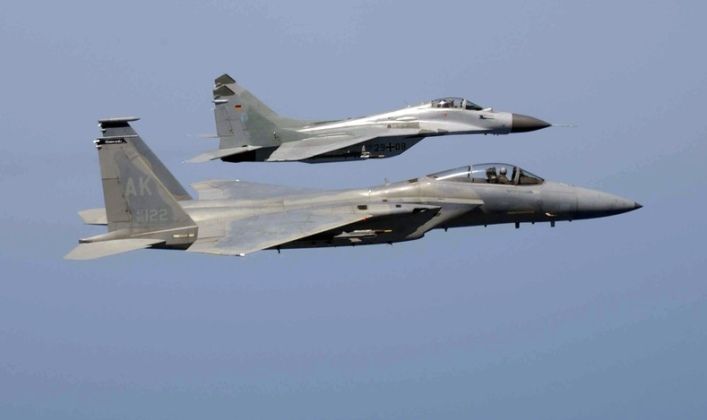 MiG-29 (top) and F-15