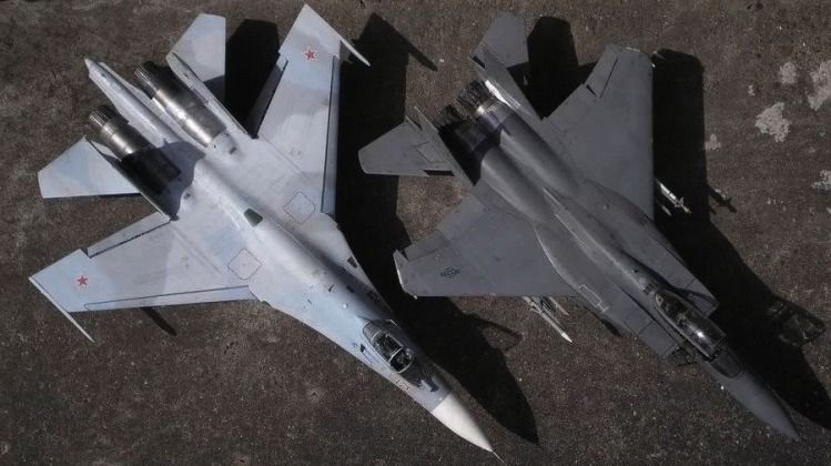 Su-27 (left) and F-15 Fighters