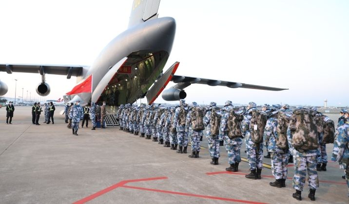 Chinese PLA Personnel Embark on Y-20 Strategic Airlifter