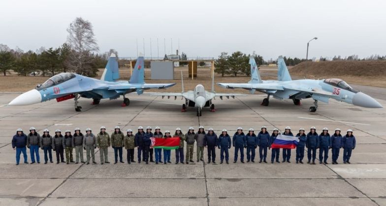 Belarusian Su-30SM (left) and MiG-29 and Russian Su-35