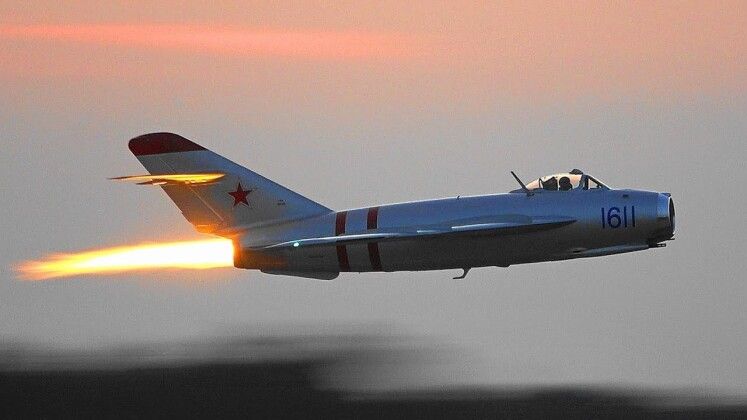 MiG-17 Fighter in Flight with Afterburner