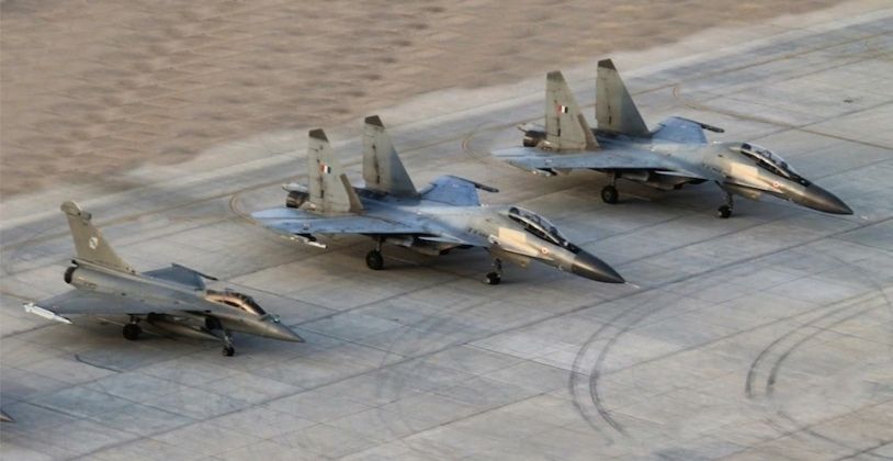 Indian Air Force Su-30MKIs (right) and Rafale