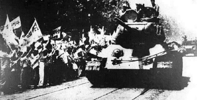 North Korean T-34 Cheered Through the Streets of Seoul in the Korean War July 1950