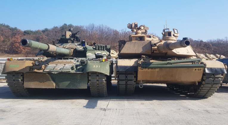 T-80U (left) and M1 Abrams Gas Turbine Powered Tanks