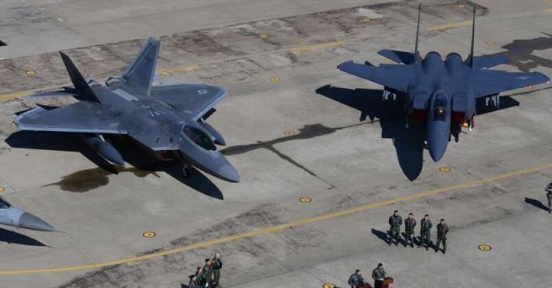 F-22 Fifth Generation and F-15 Fourth Generation Fighters