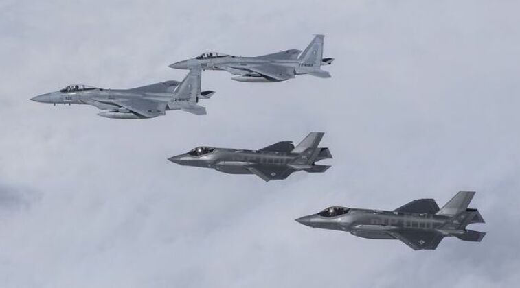 F-15s and F-35s in Formation