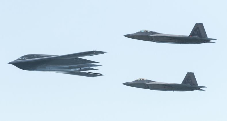 B-2 Spirit Bomber with F-22 Escort