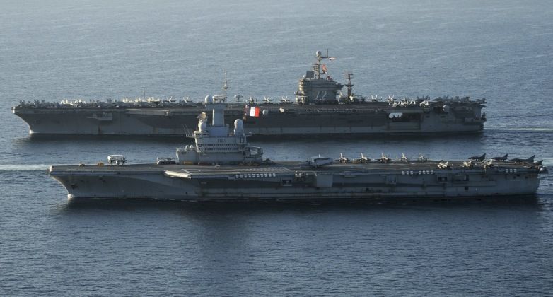 French Carrier Charles De Gaulle and America Nimitz Class Supercarrier