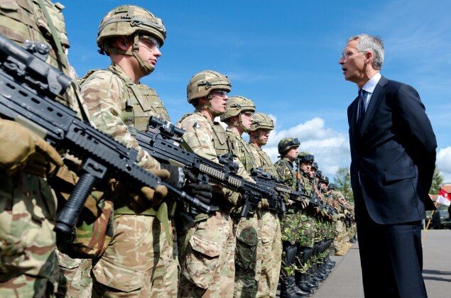 NATO Secretary General Stoltenberg Inspects British Soldiers