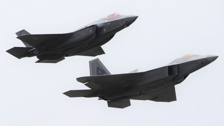 F-35 (left) and F-22 Fighters 