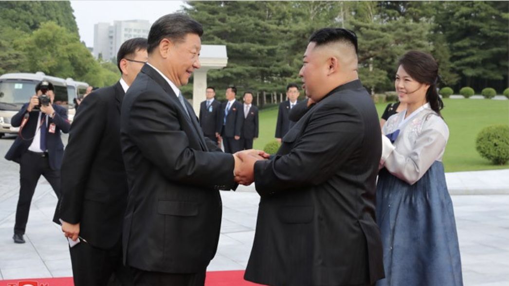 Chinese Premier Xi Jinping Greets North Korean Leader Kim Jong Un and First Lade Ri Sol Ju in Pyongyang