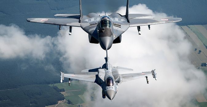 MiG-29A (top) and F-16 Fighting Falcon