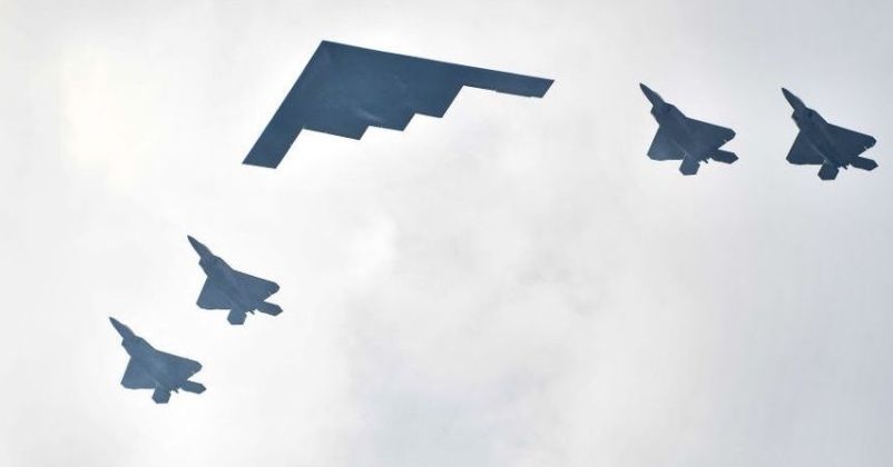 B-2 Leads F-22 Fighters in Formation