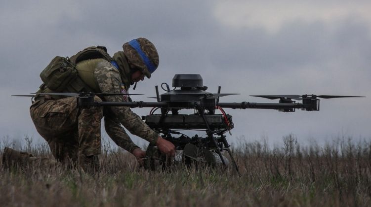 Ukrainian Serviceman and Logistics Drone - AI Has Played a Growing Role in War in the Ukrainian Theatre